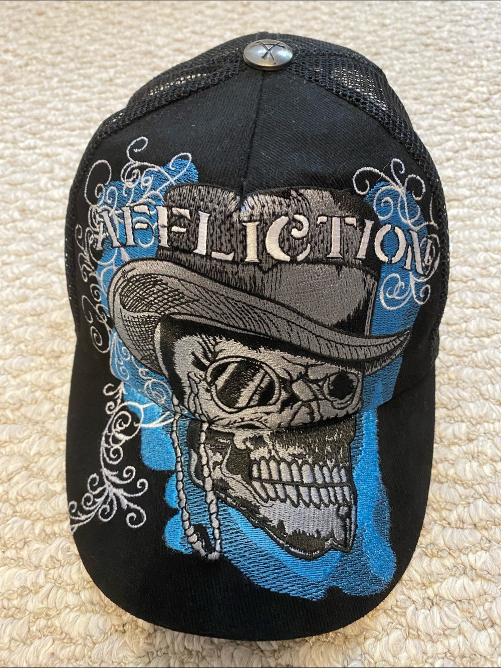 Affliction Black Trucker Hat with Blue and Gray Skull Design